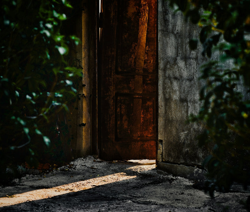 Open doorway with sunlight streaming through